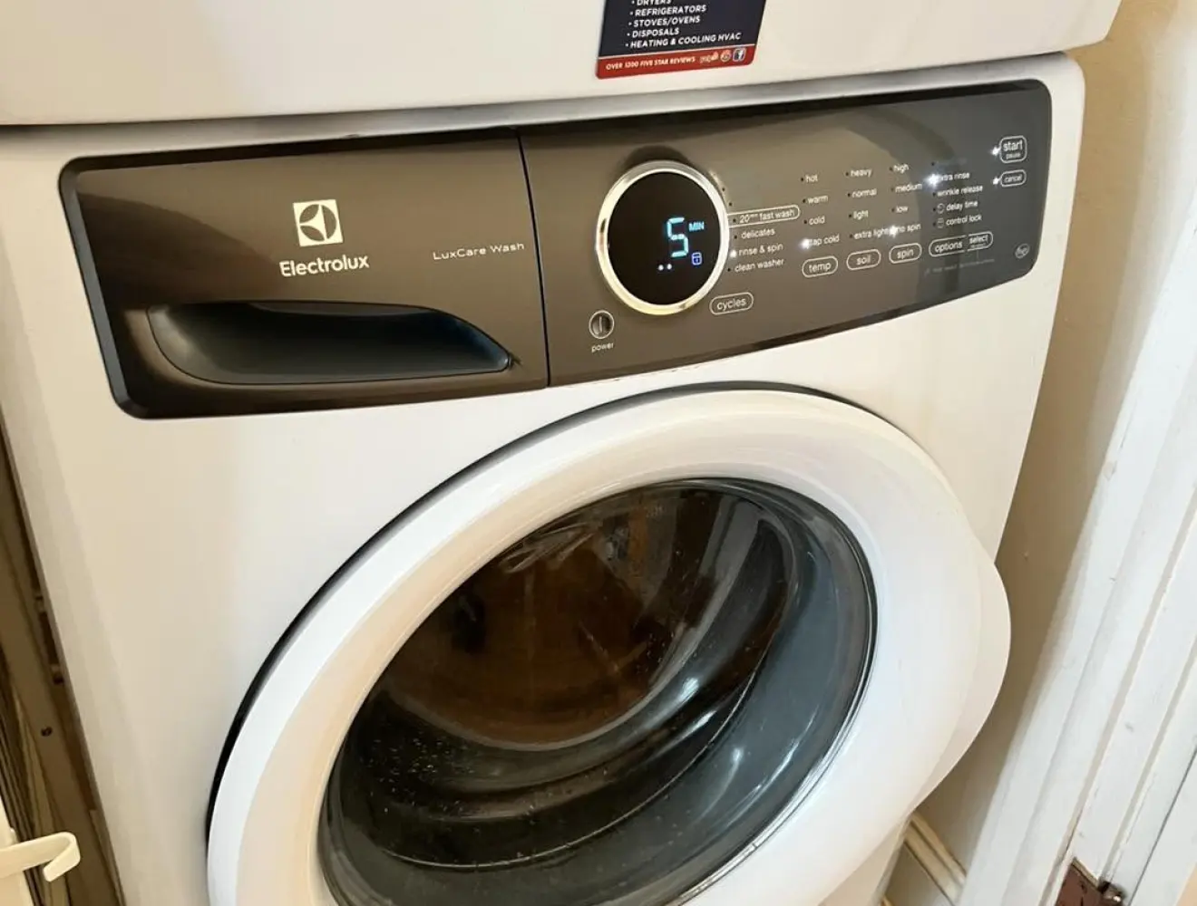 A white front-loading washing machine