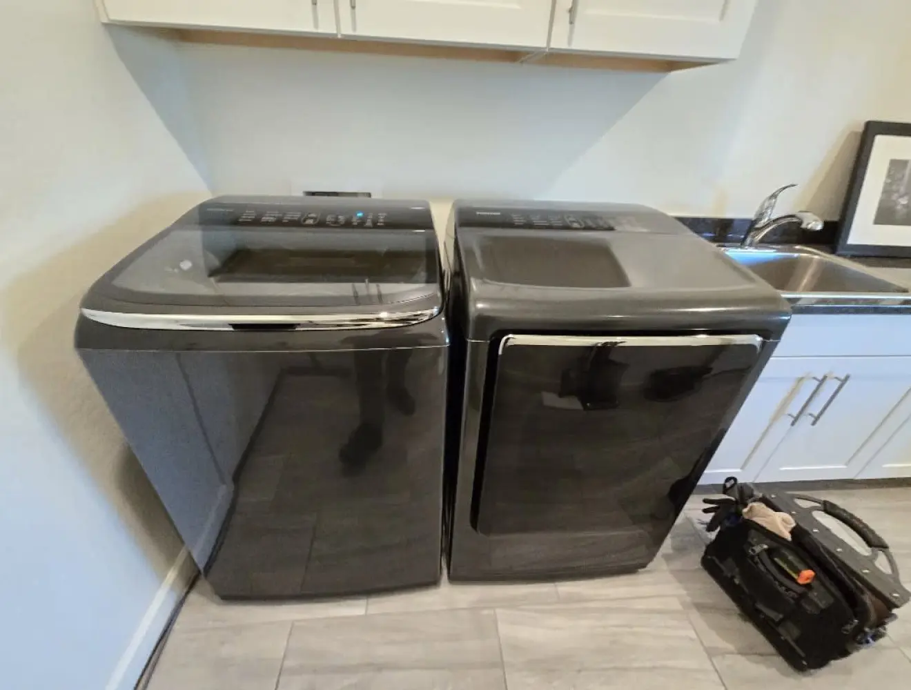 A washing machine and tumble dryer side by side