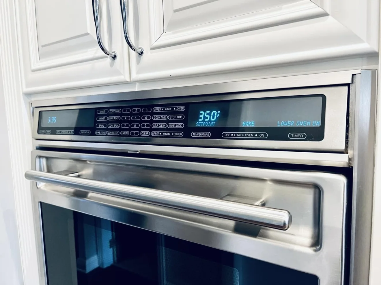 The control panel and door of a built-in electric oven